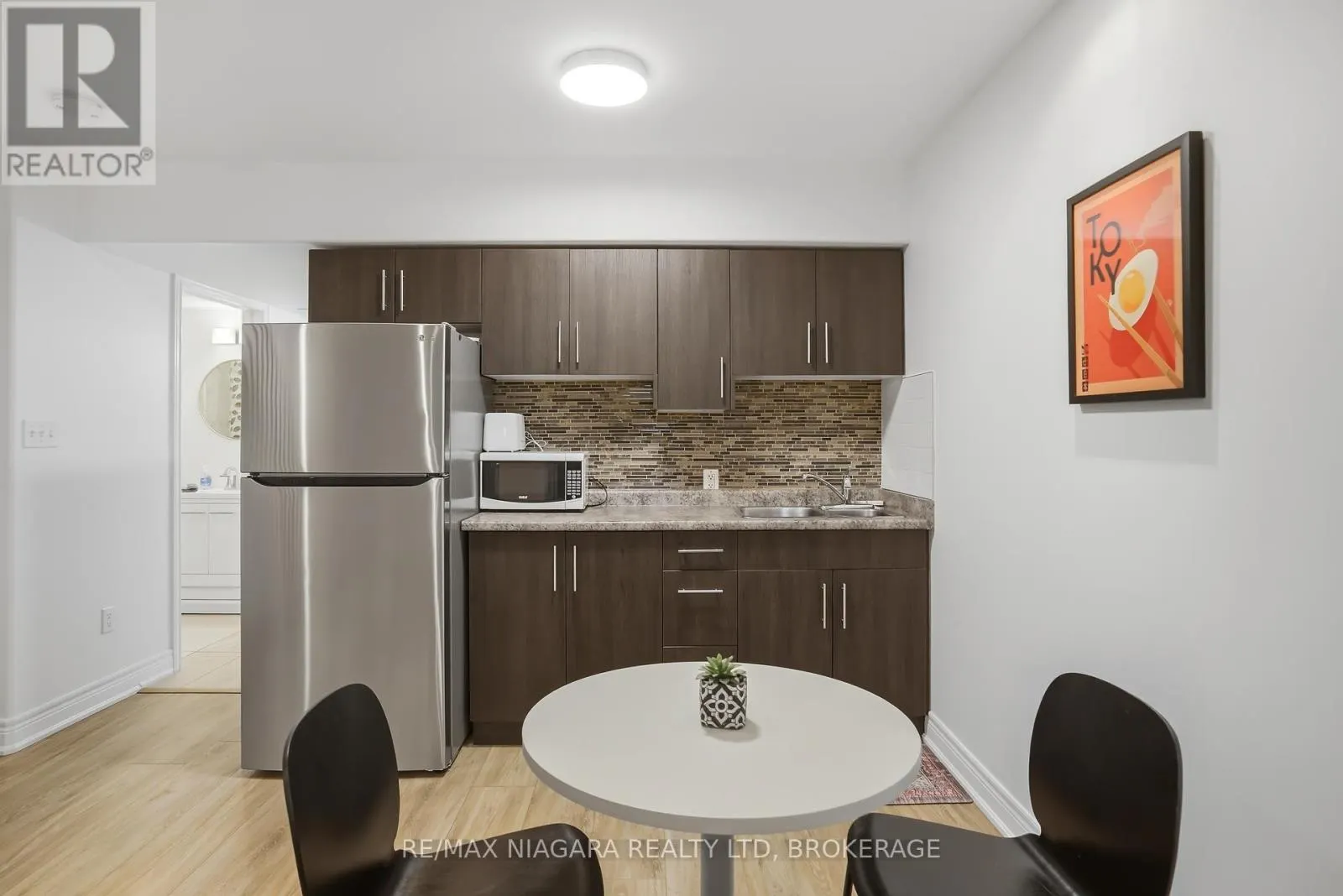 104 - 6045 DUNN STREET #104