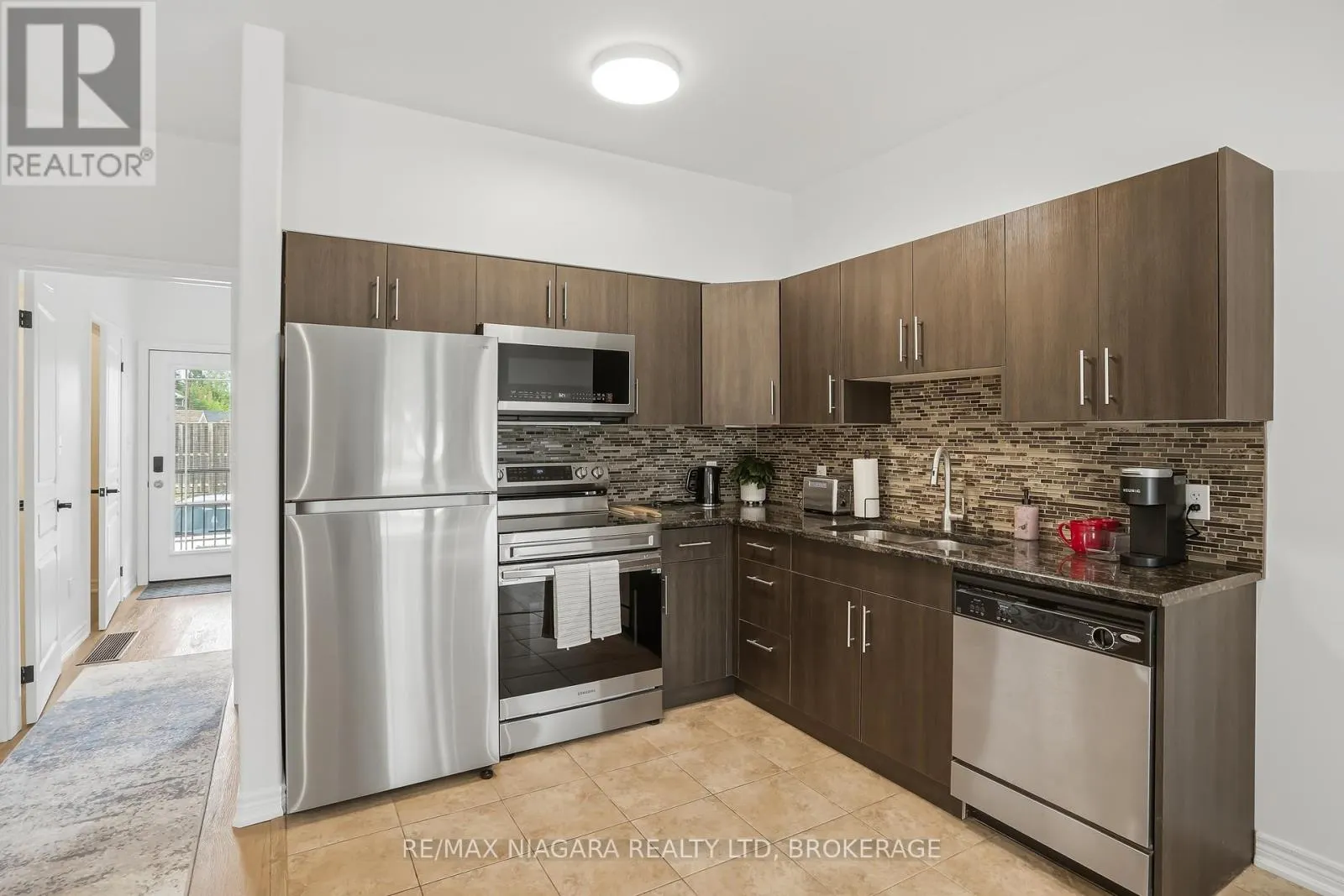 104 - 6045 DUNN STREET #104