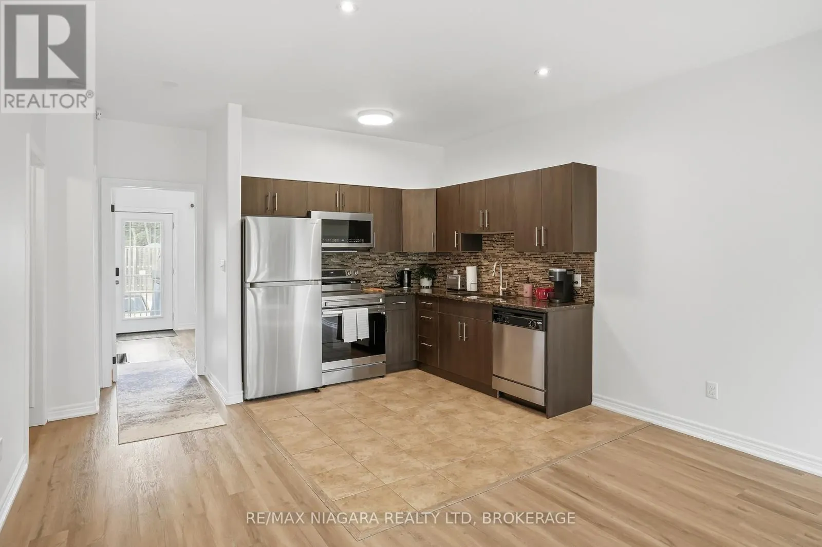104 - 6045 DUNN STREET #104