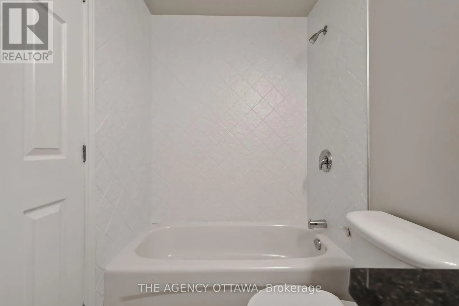 203 - 711 CHURCHILL AVENUE N