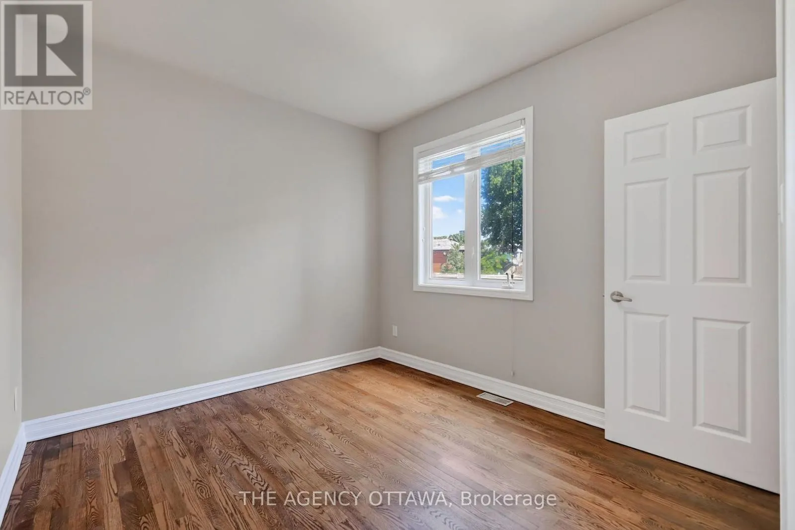 203 - 711 CHURCHILL AVENUE N