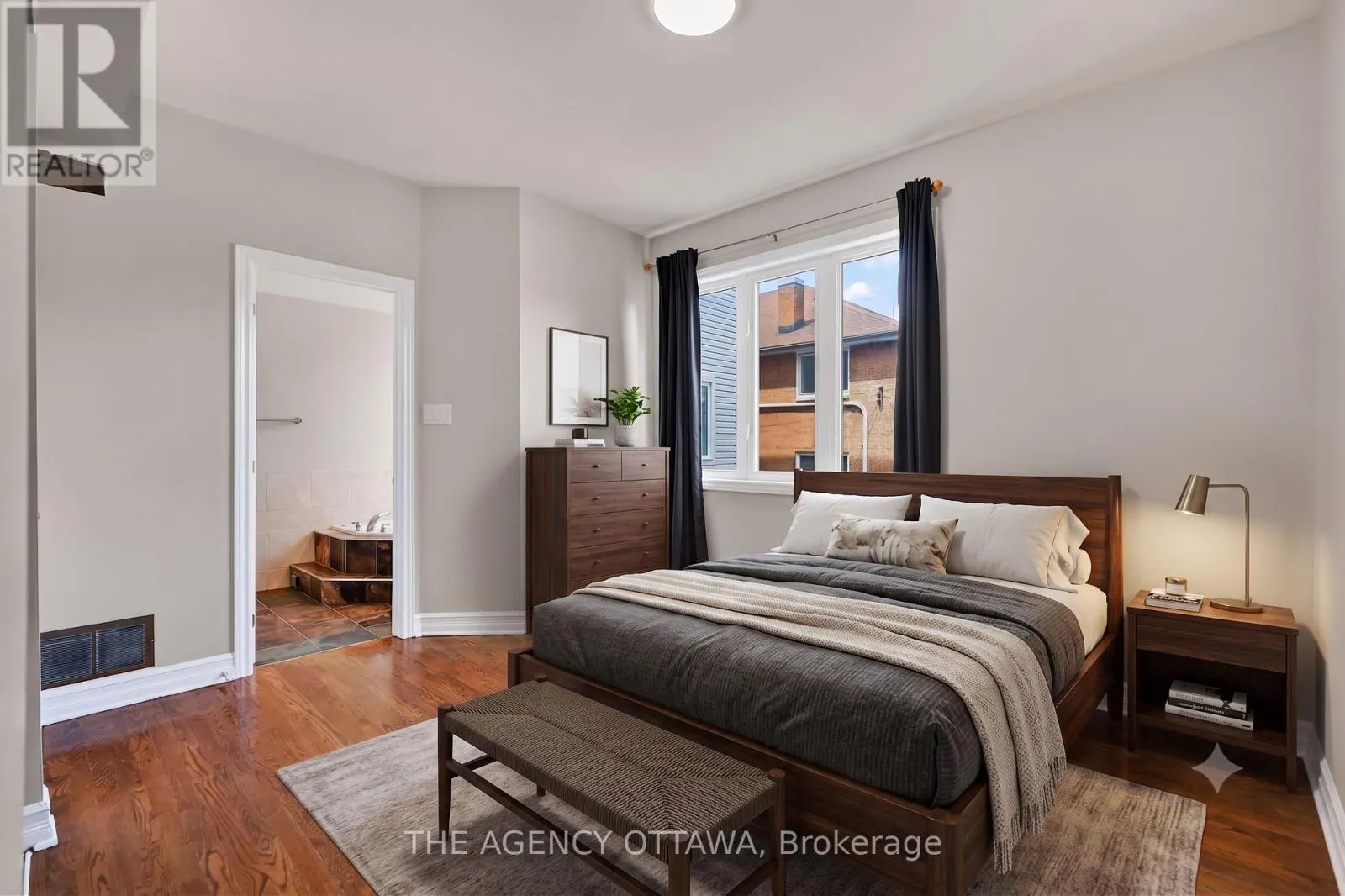 203 - 711 CHURCHILL AVENUE N