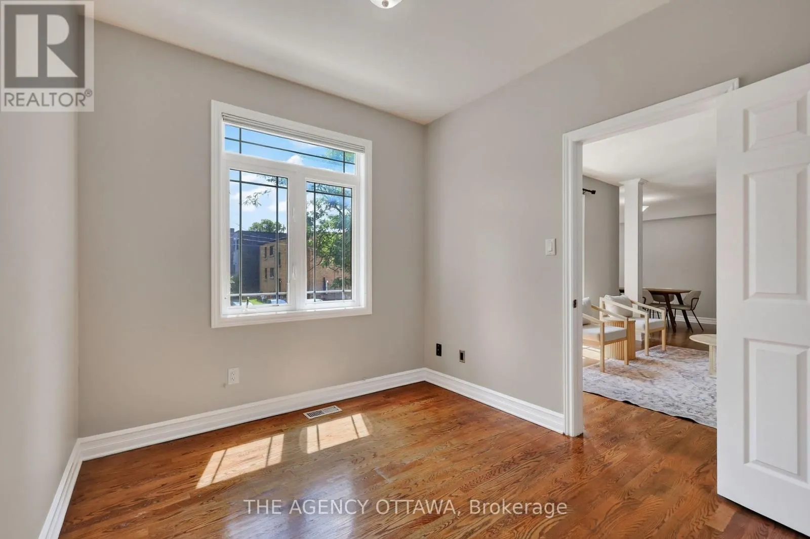 203 - 711 CHURCHILL AVENUE N