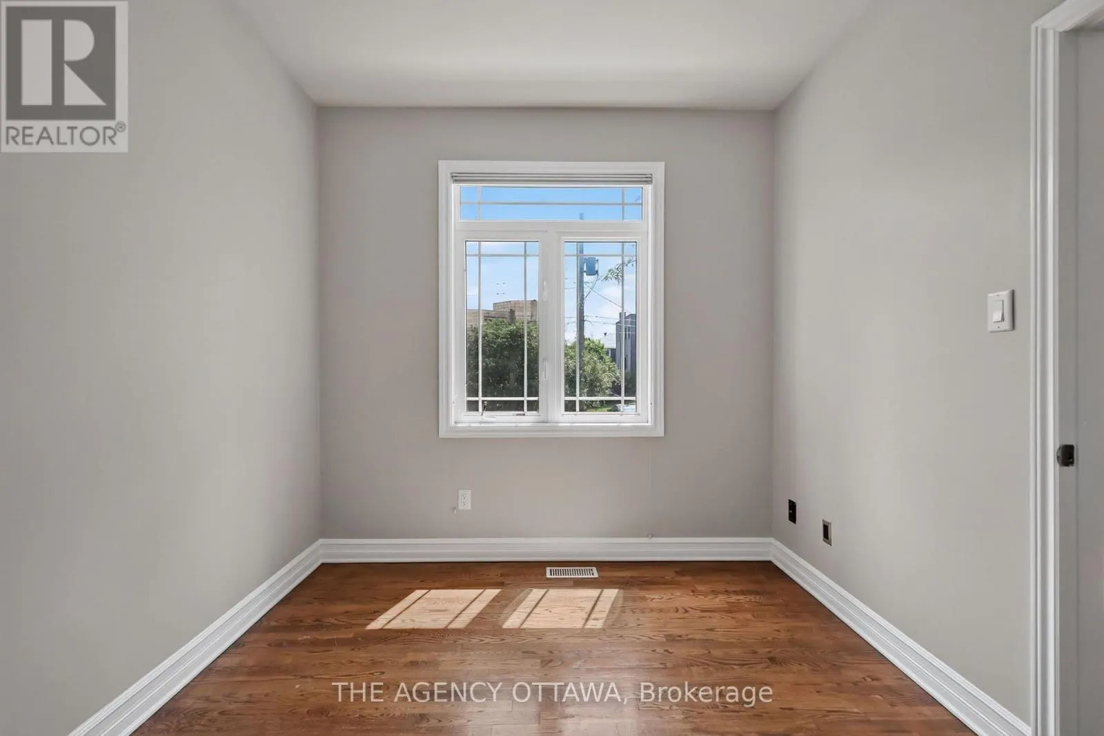203 - 711 CHURCHILL AVENUE N