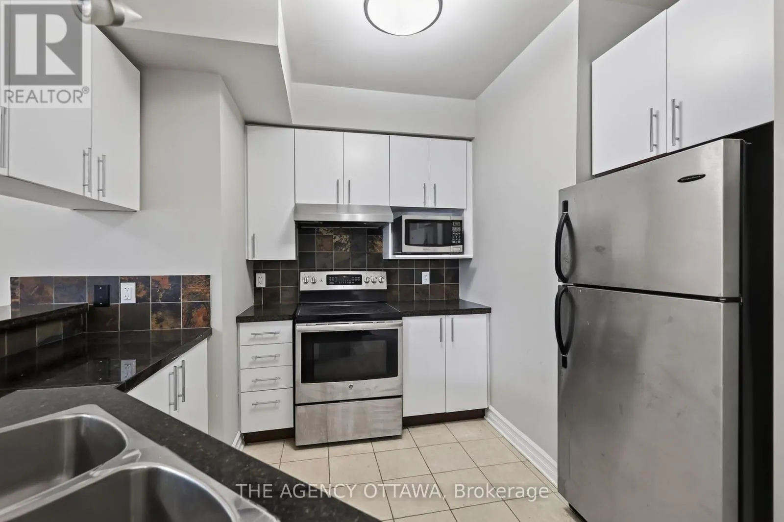 203 - 711 CHURCHILL AVENUE N