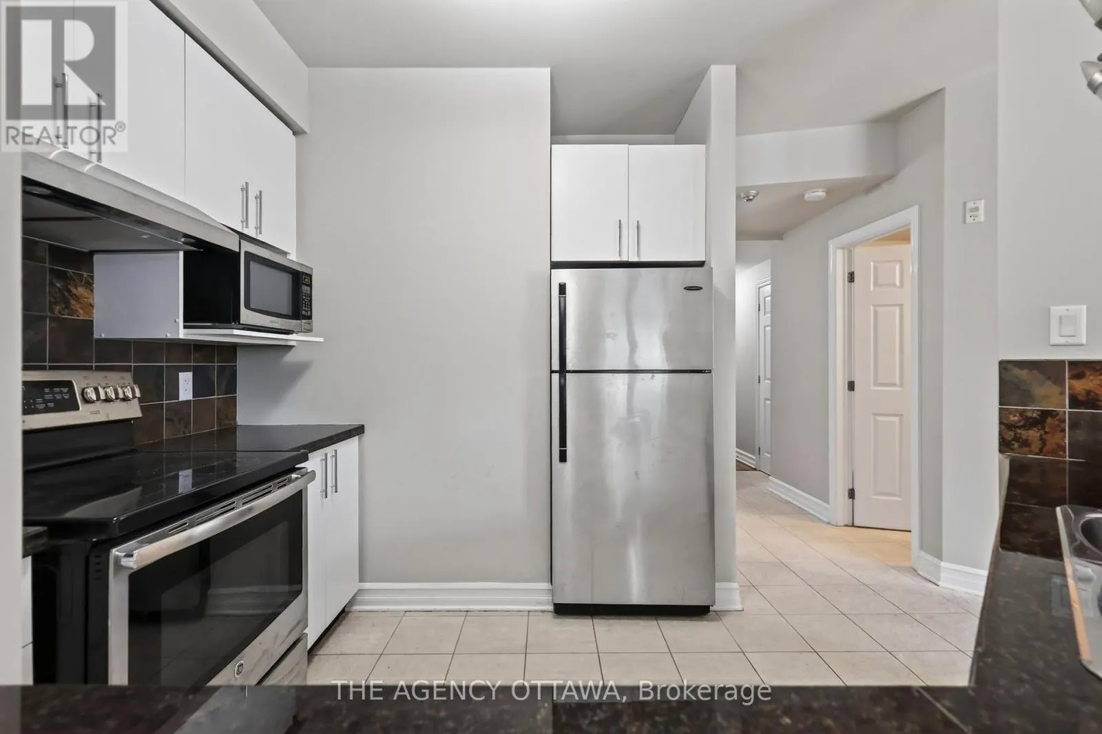 203 - 711 CHURCHILL AVENUE N