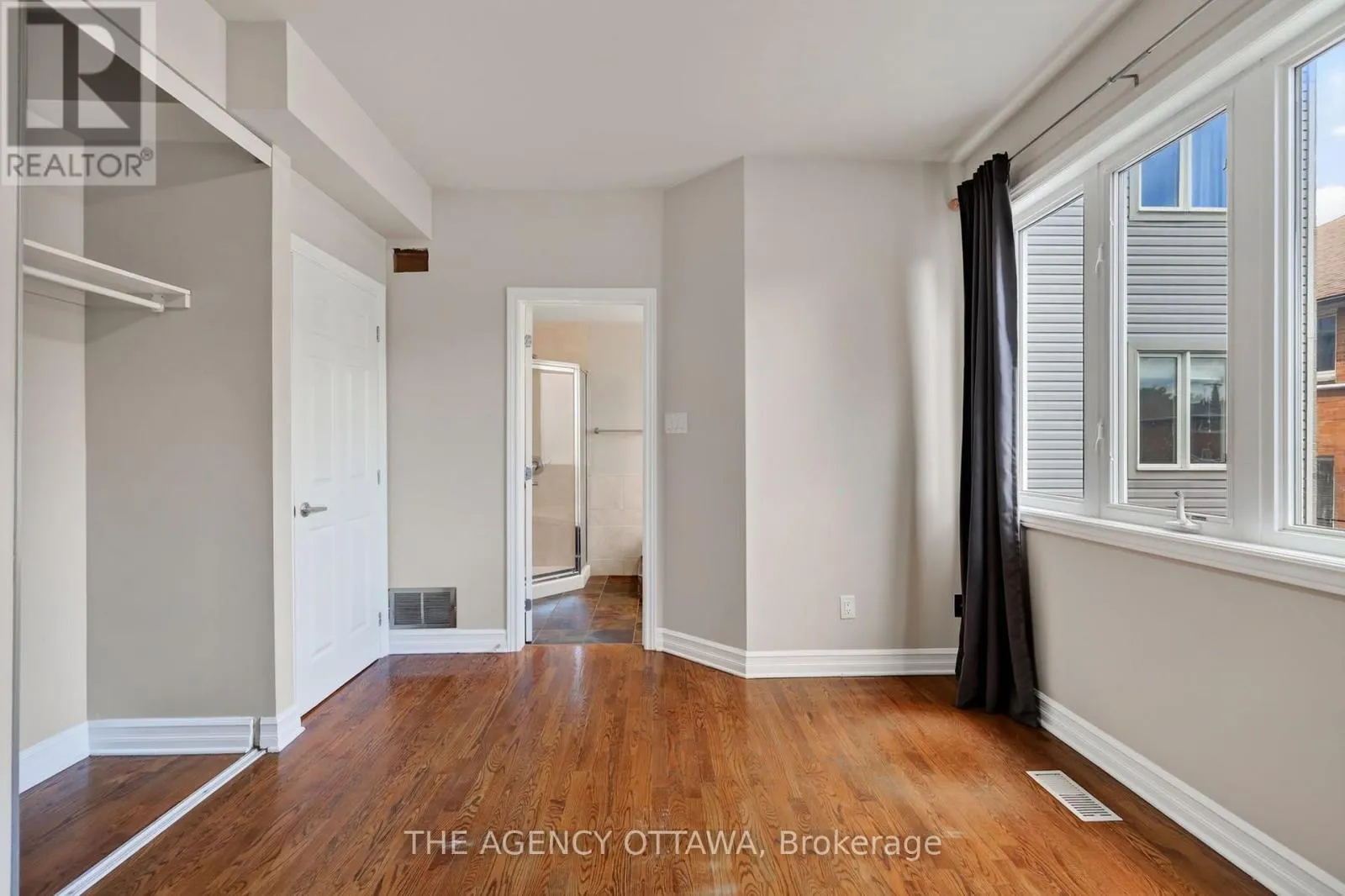 203 - 711 CHURCHILL AVENUE N
