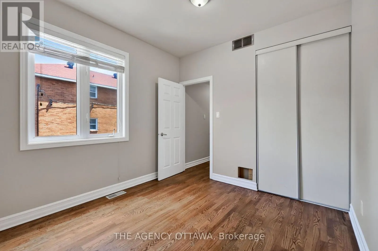 203 - 711 CHURCHILL AVENUE N