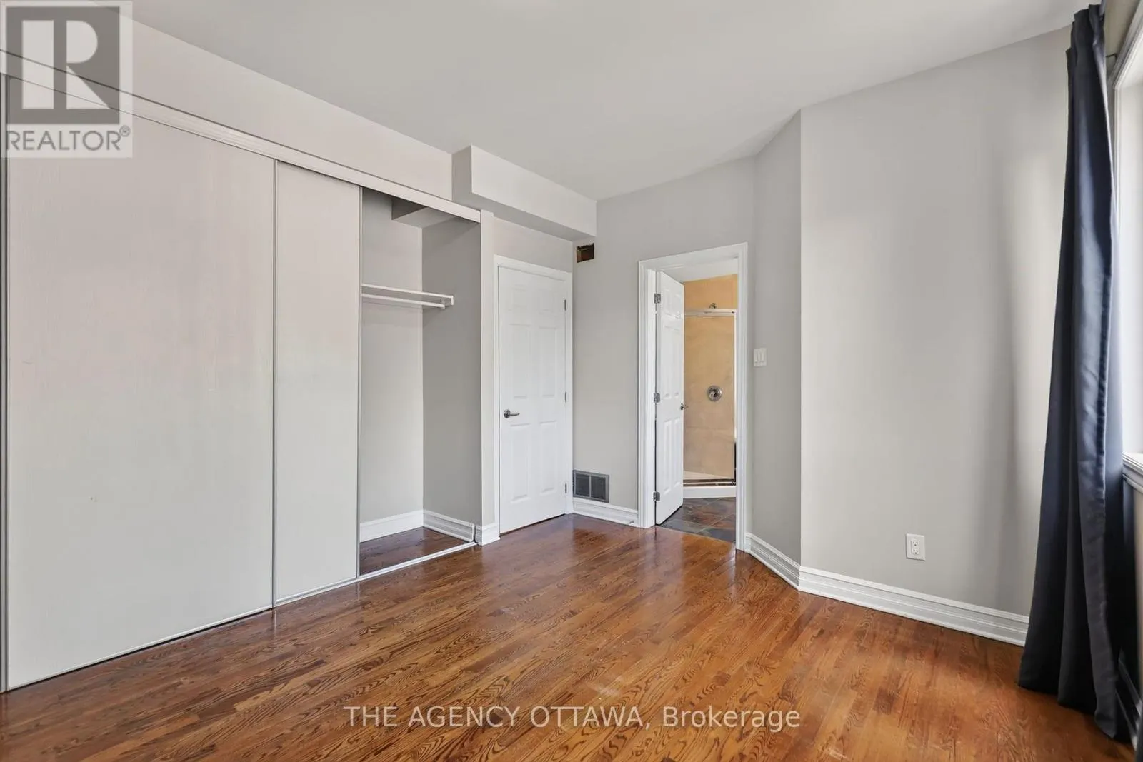 203 - 711 CHURCHILL AVENUE N