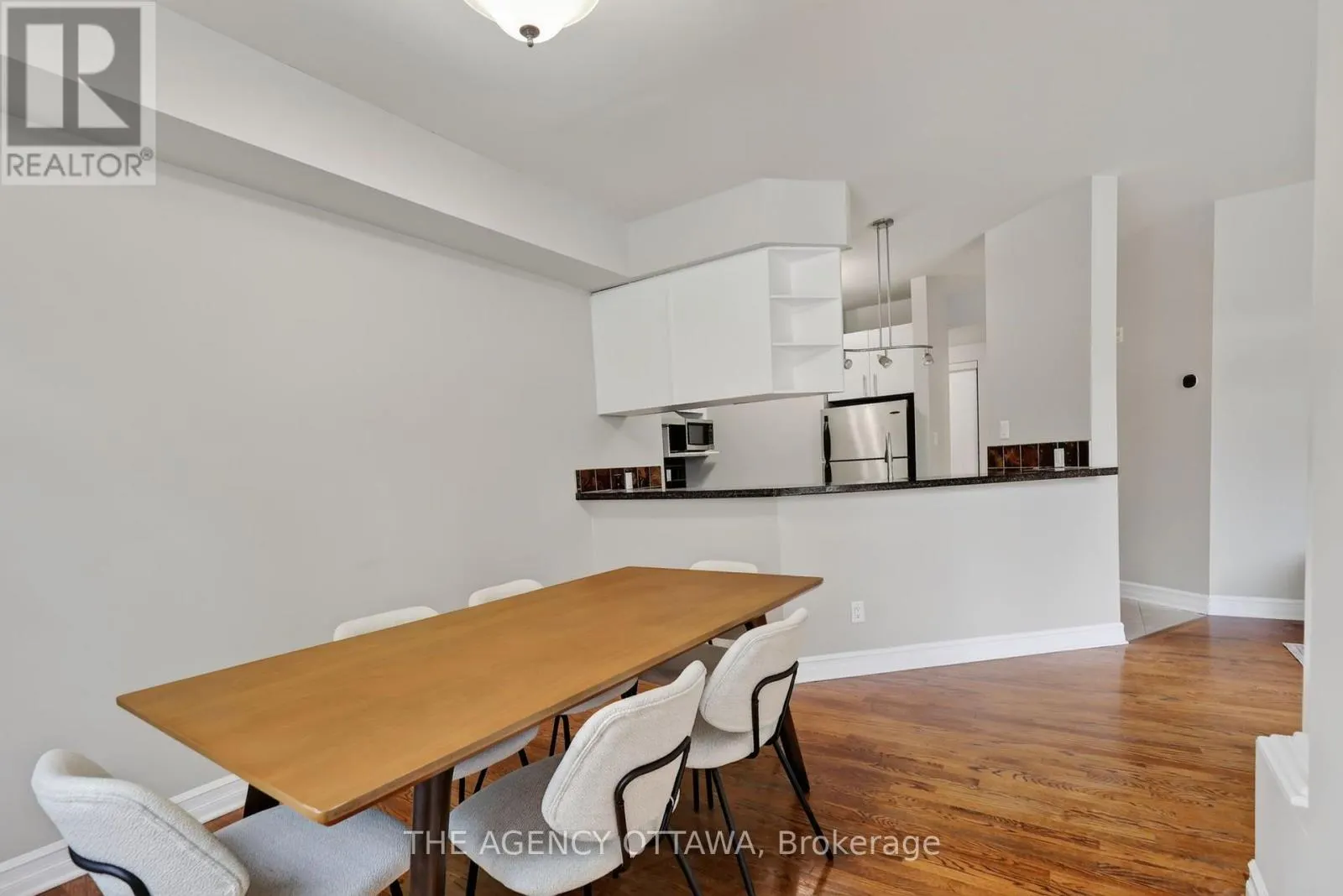 203 - 711 CHURCHILL AVENUE N