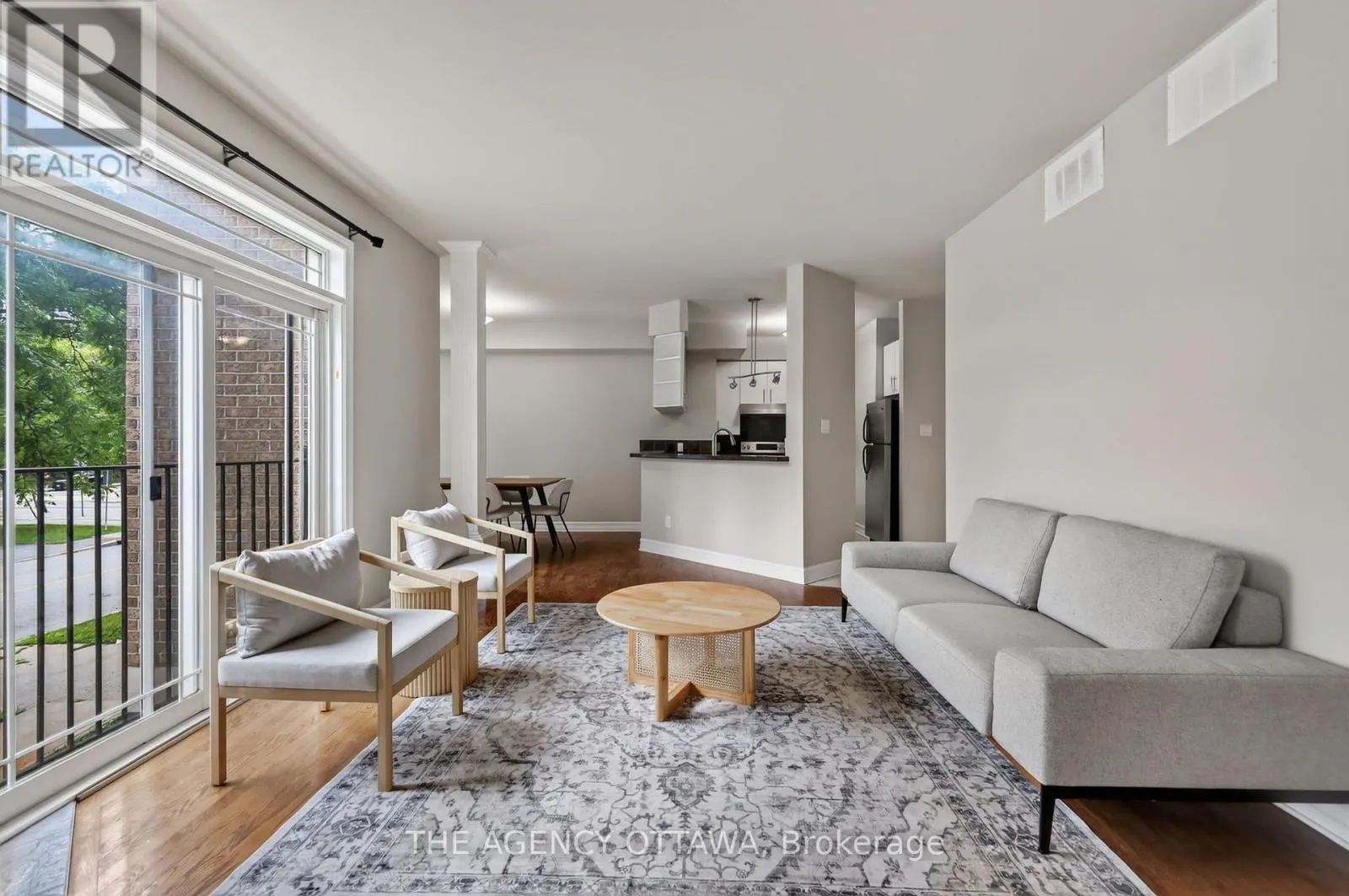 203 - 711 CHURCHILL AVENUE N