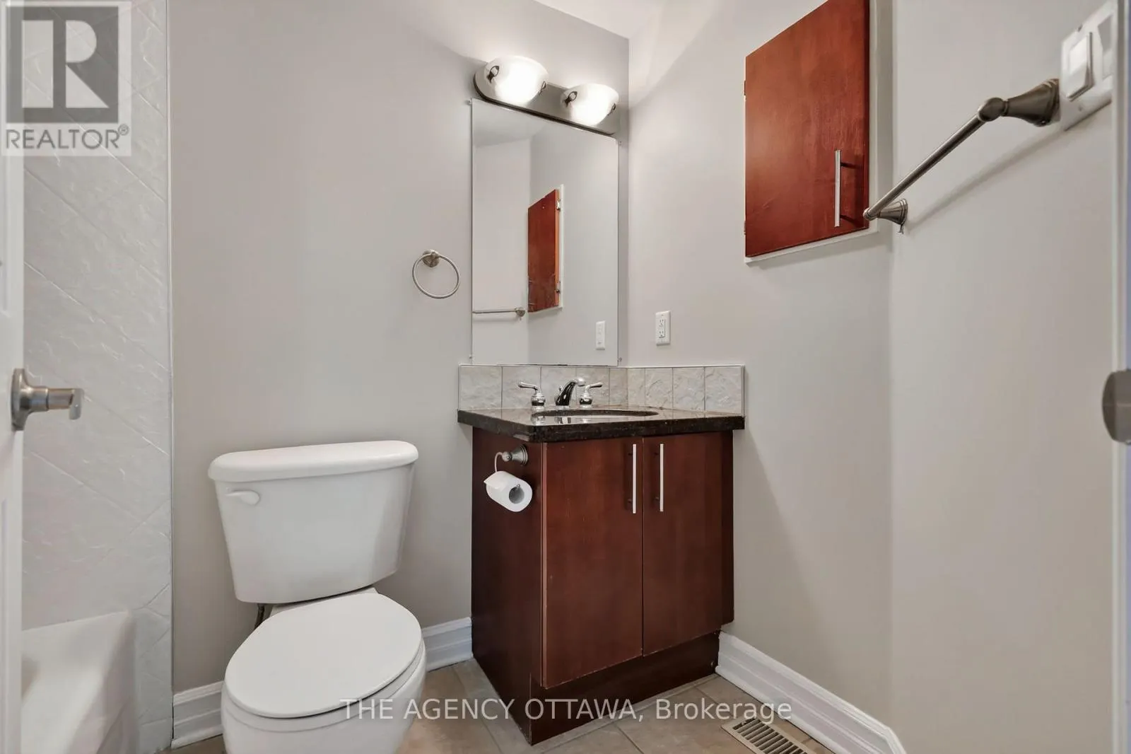 203 - 711 CHURCHILL AVENUE N