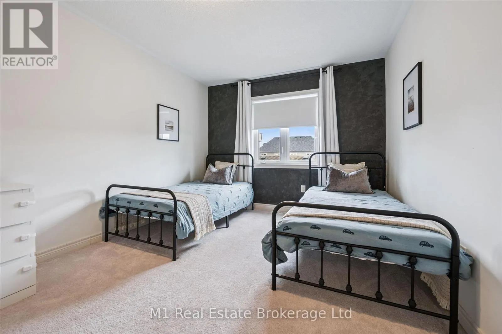 3 - 65 ELLIOT AVENUE E #3