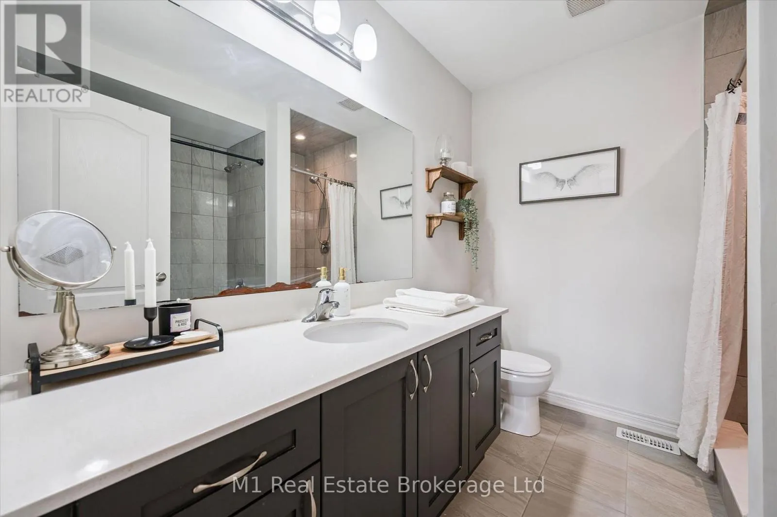 3 - 65 ELLIOT AVENUE E #3