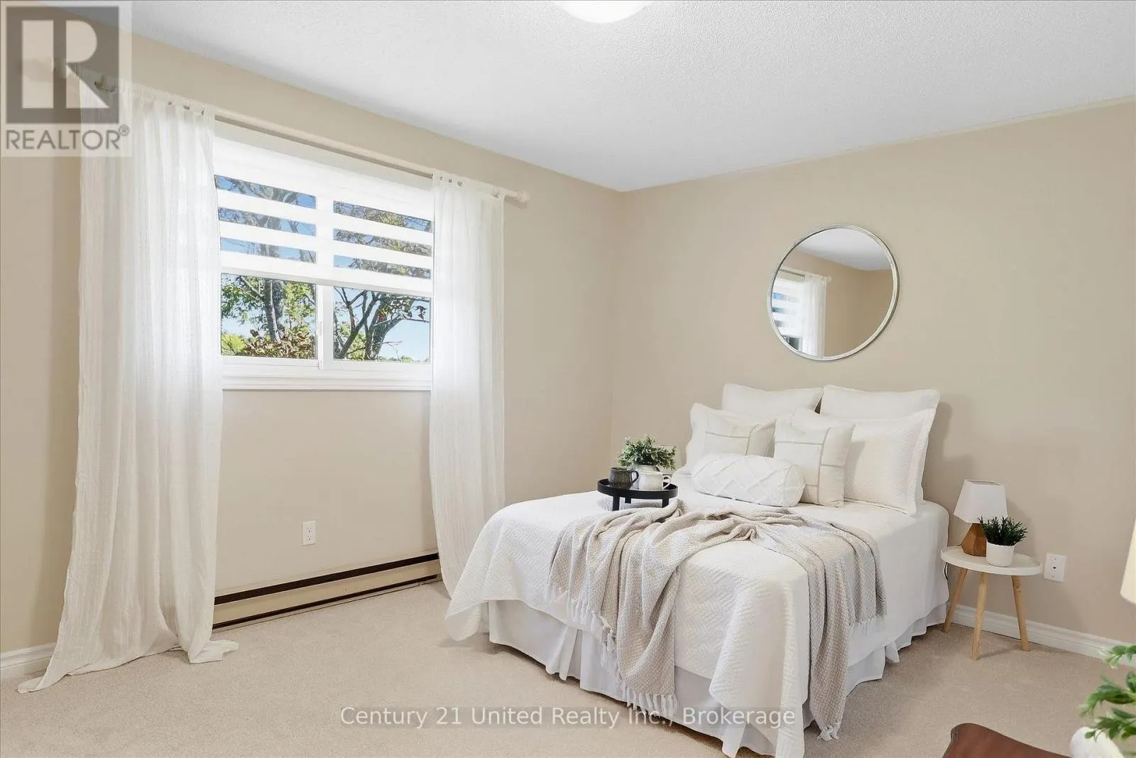 202 - 2406 MOUNTLAND DRIVE #202