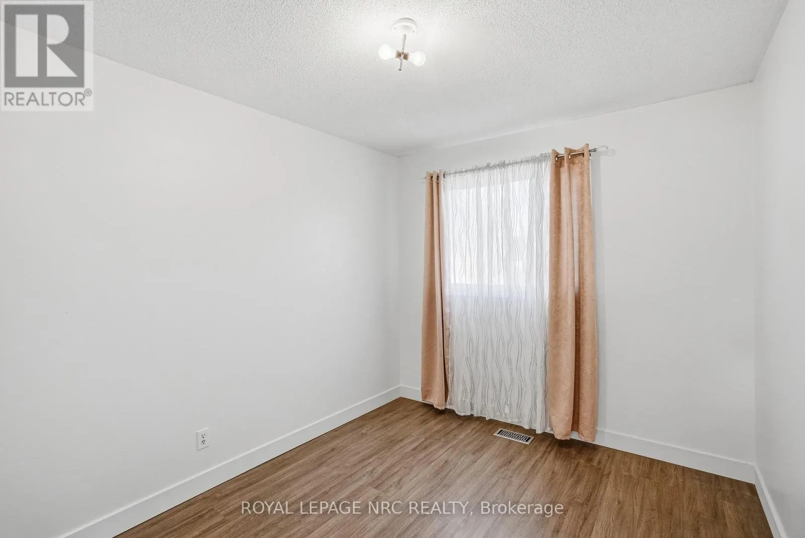6033 WILDROSE CRESCENT