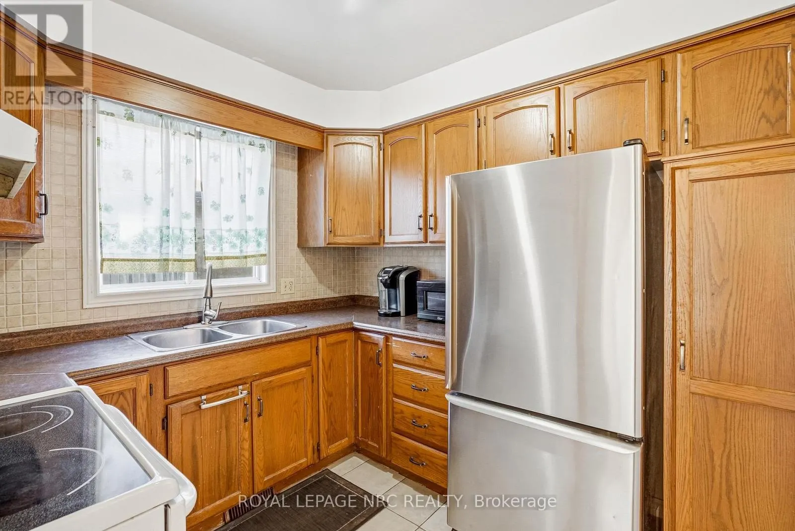 6033 WILDROSE CRESCENT