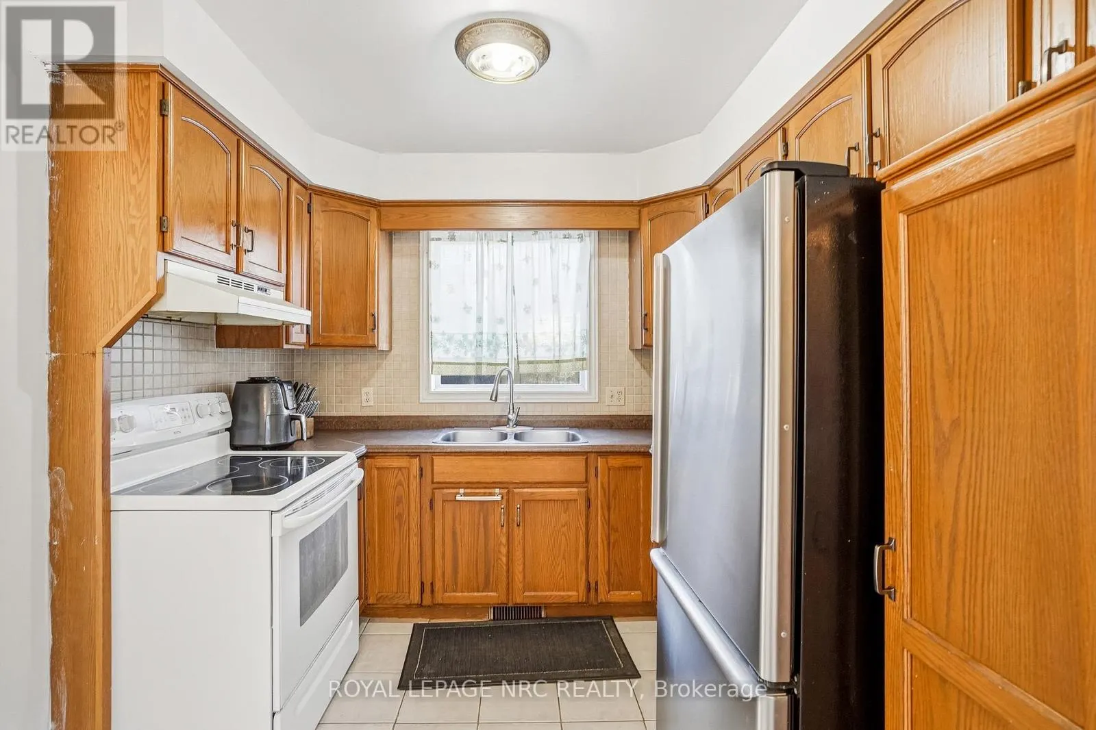 6033 WILDROSE CRESCENT