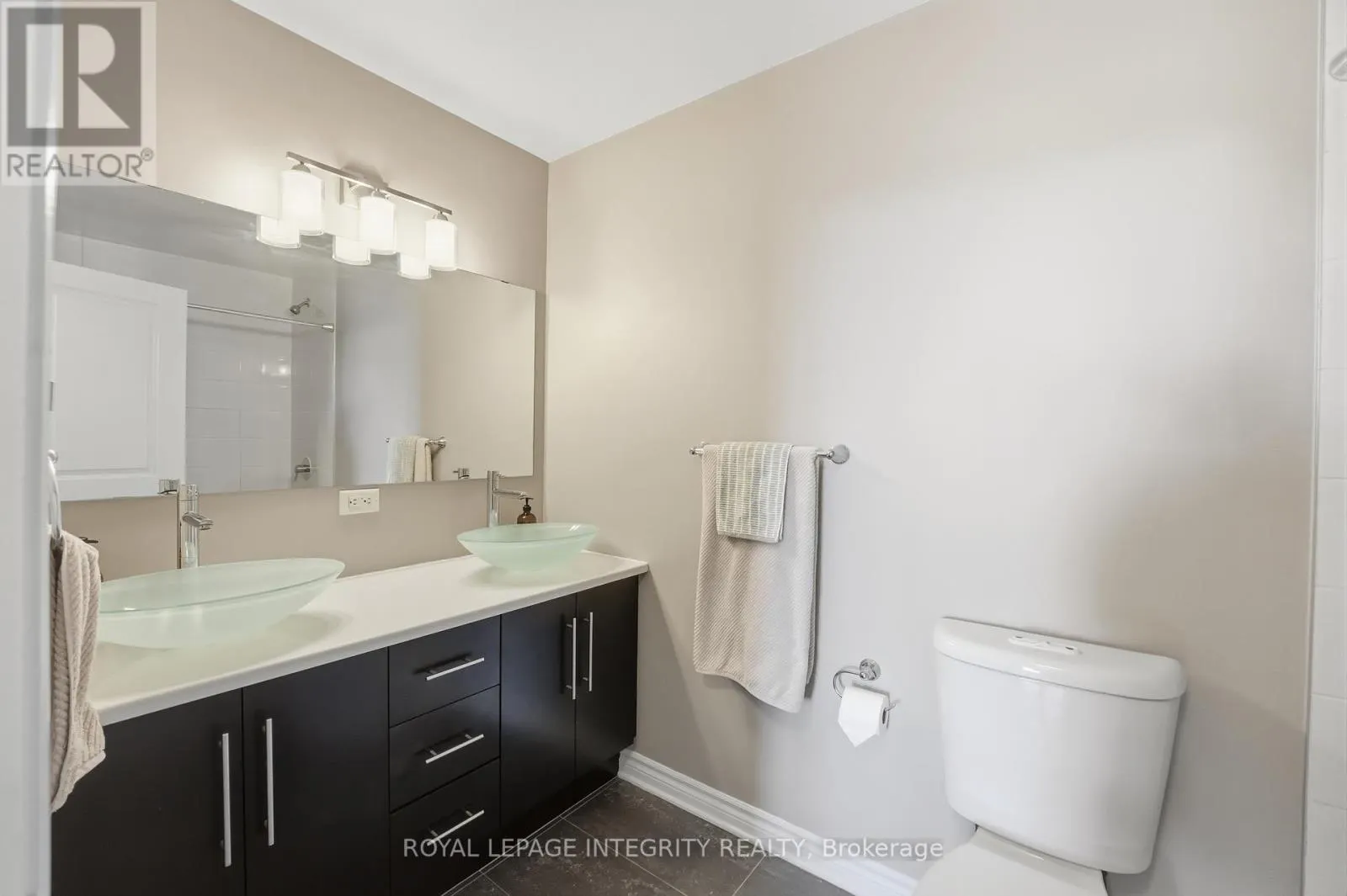 310 - 682 CHURCHILL AVENUE N