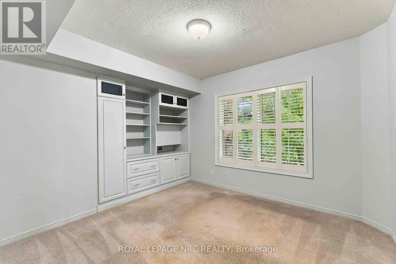 205 - 4090 JOHN CHARLES BOULEVARD #205