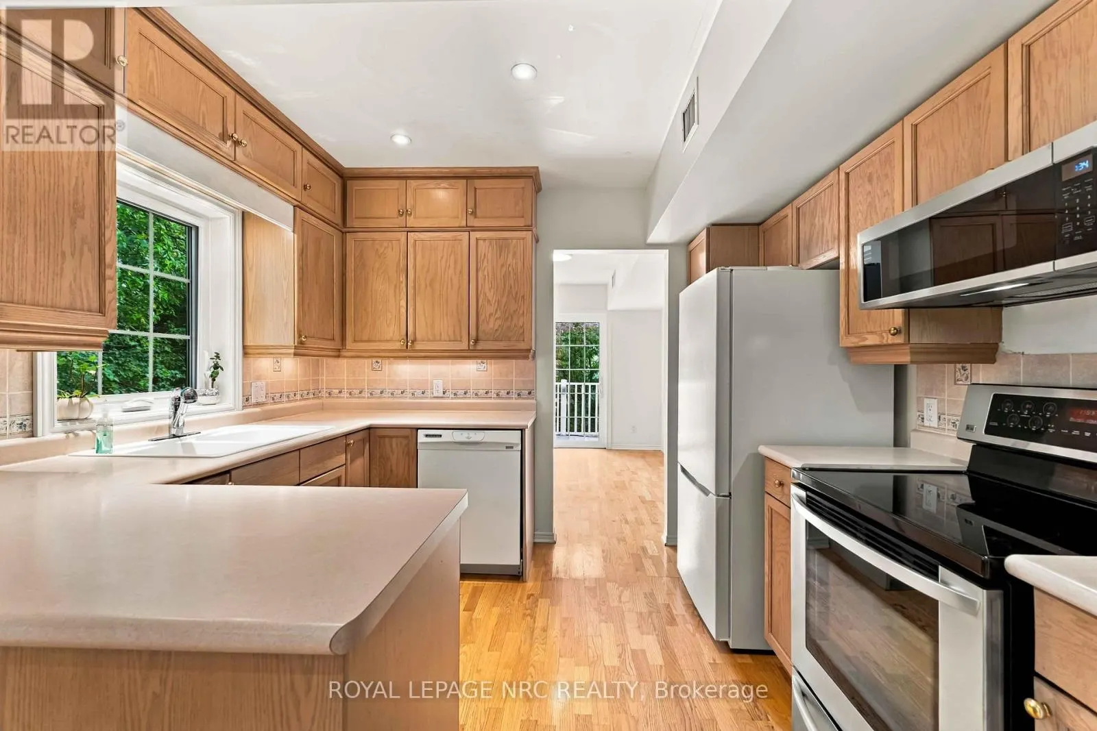 205 - 4090 JOHN CHARLES BOULEVARD #205