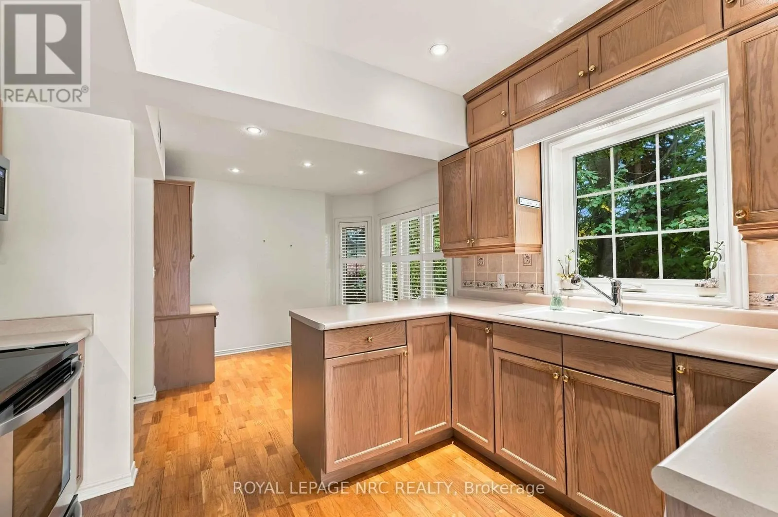 205 - 4090 JOHN CHARLES BOULEVARD #205