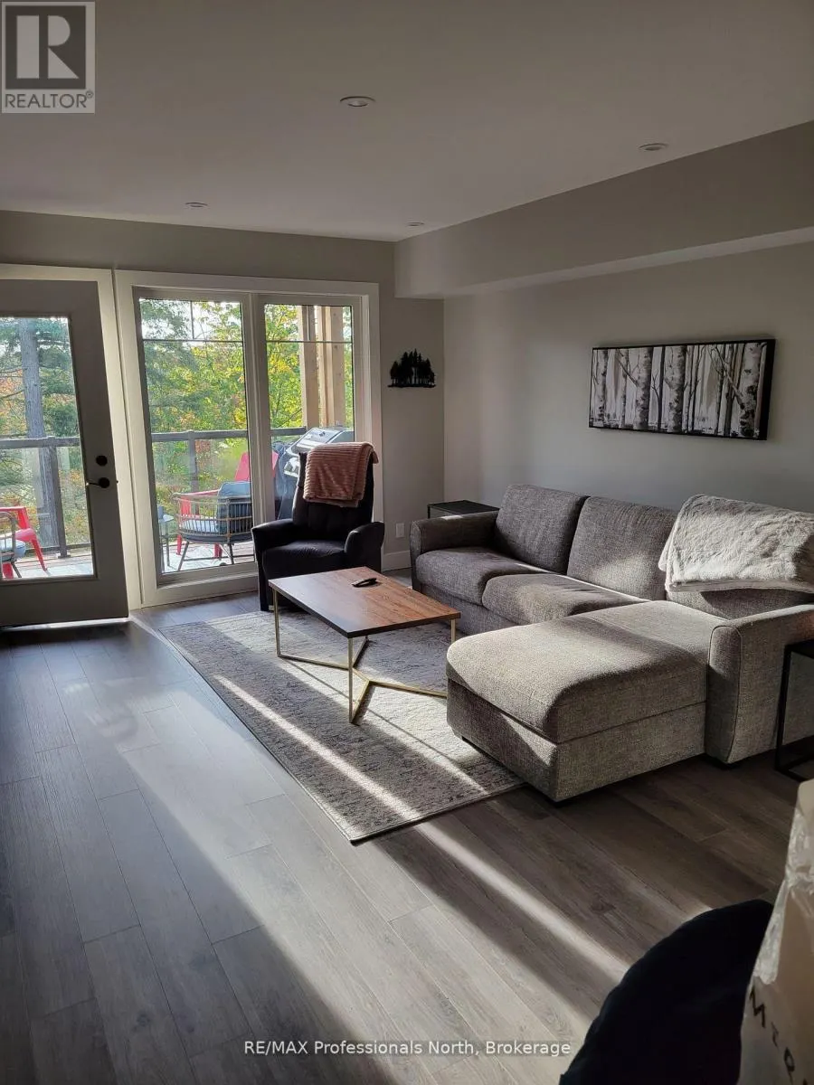 202 - 3 TREE TOPS LANE #202