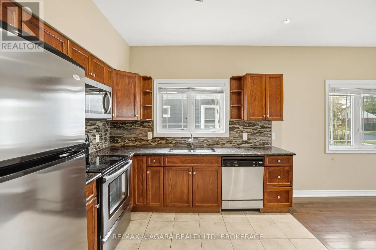 106 - 6045 DUNN STREET #106