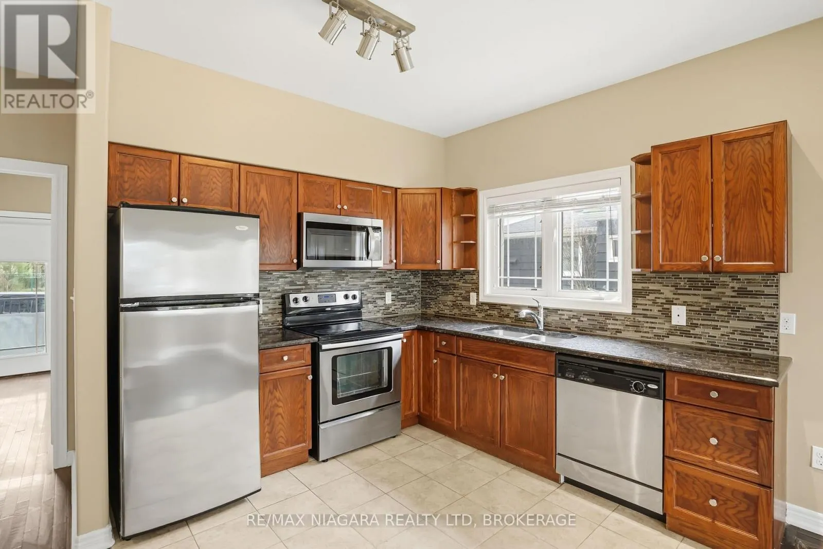 106 - 6045 DUNN STREET #106