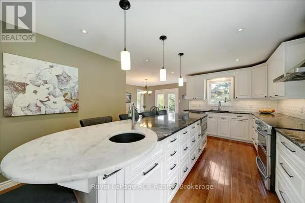 303 6TH AVENUE W