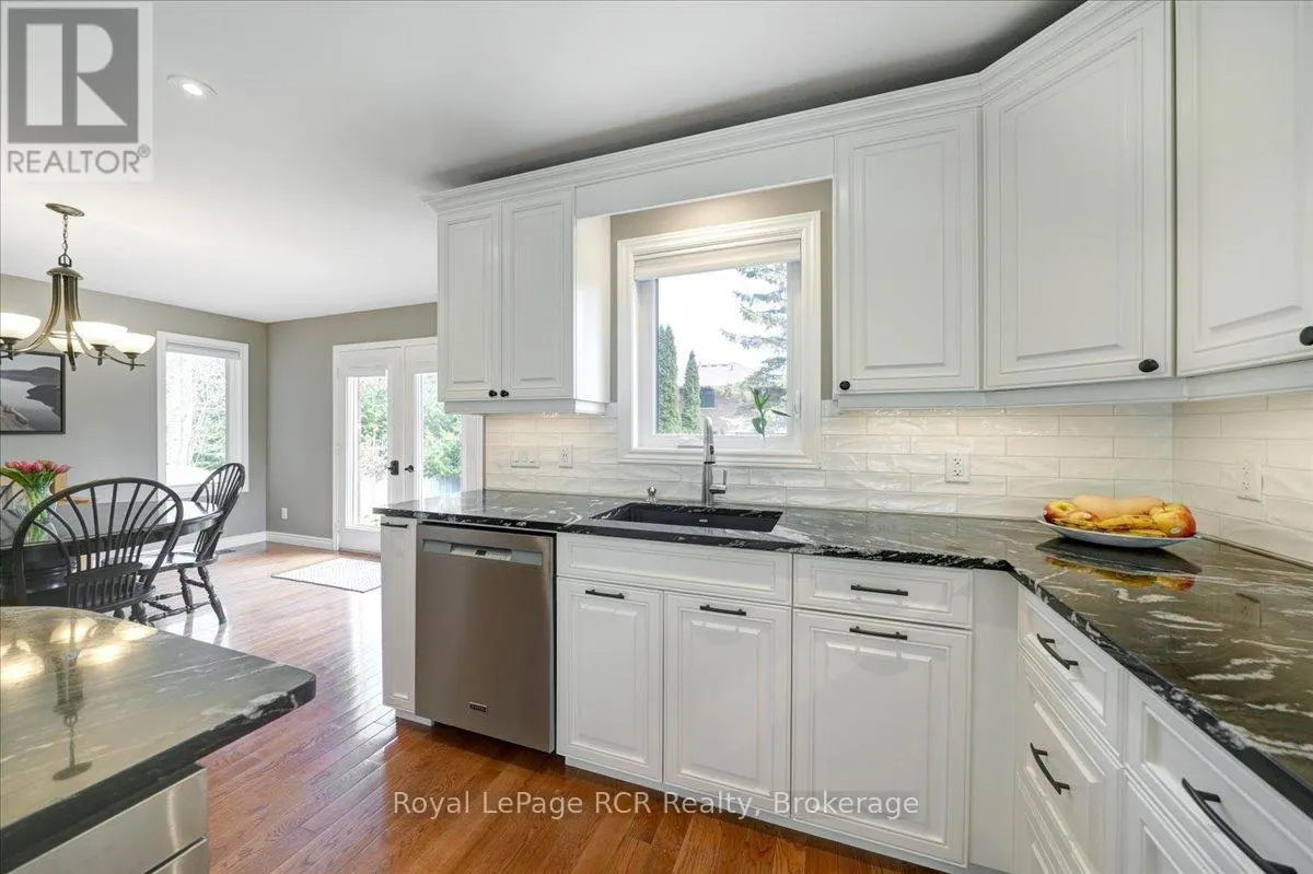 303 6TH AVENUE W