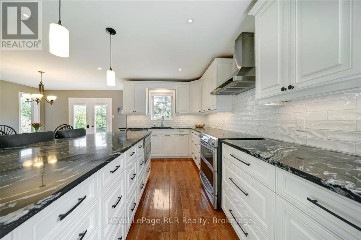 303 6TH AVENUE W