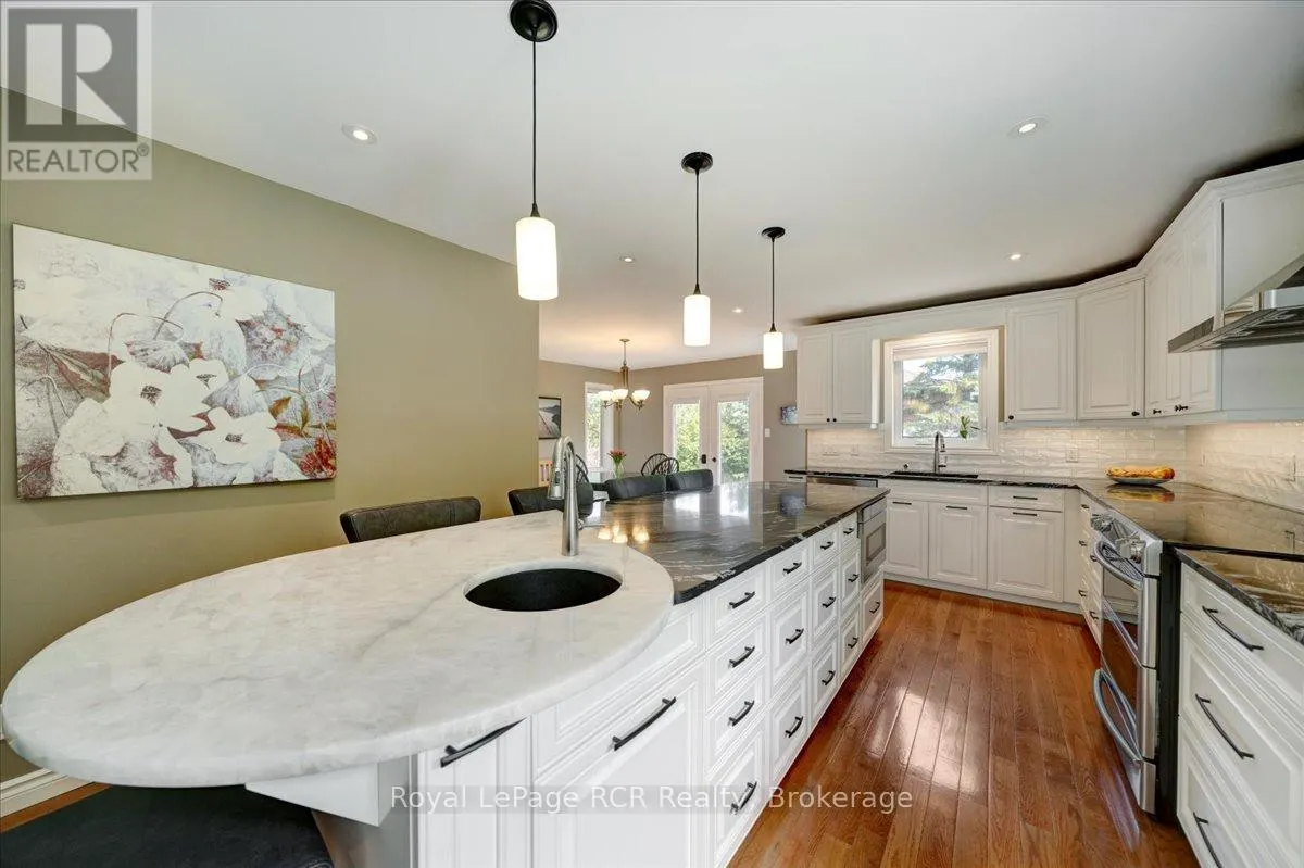 303 6TH AVENUE W
