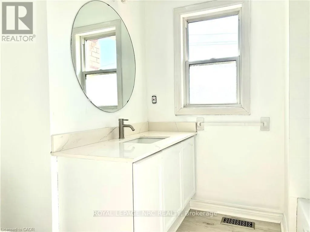 A - 299 MAIN STREET E