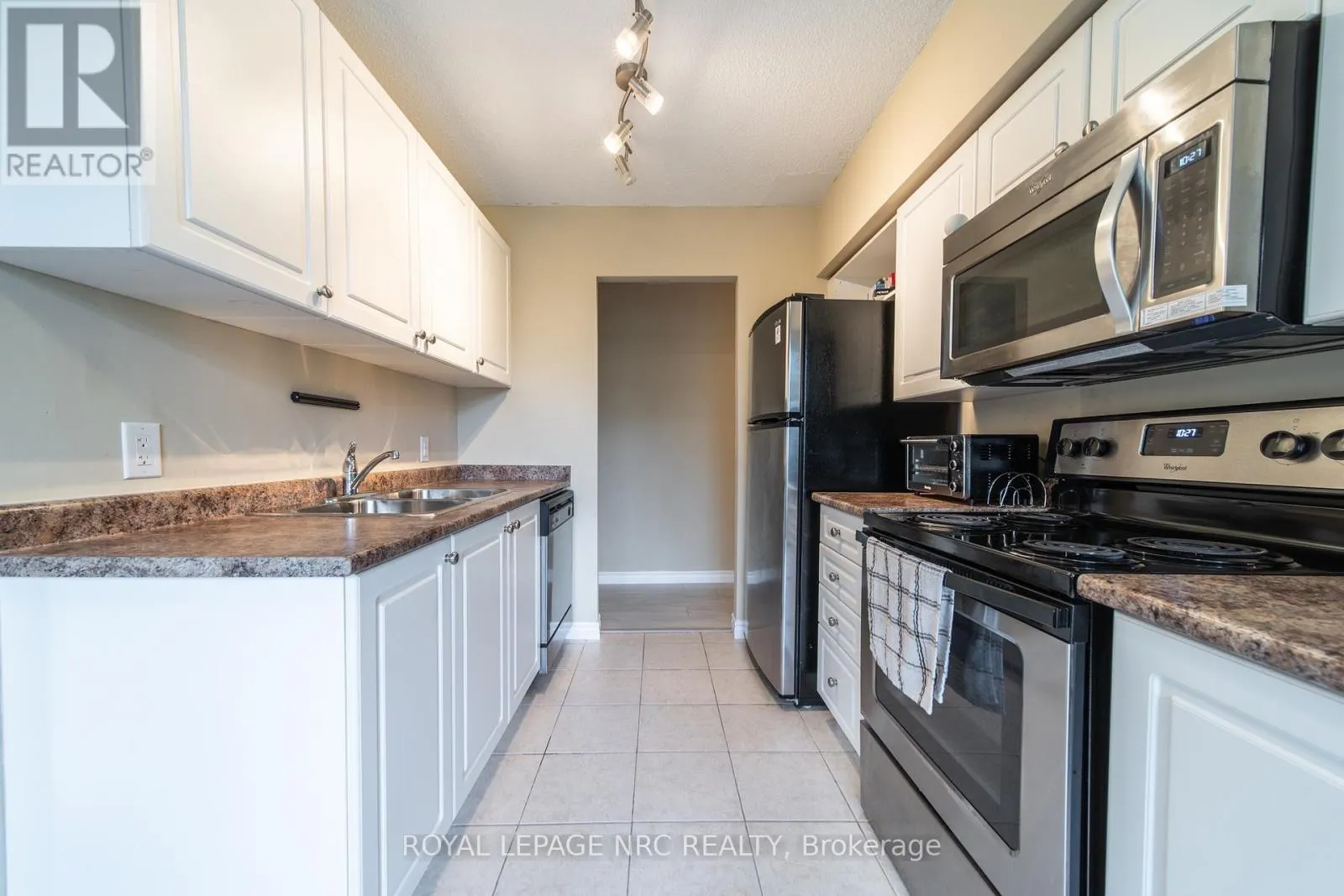 301 - 6400 HUGGINS STREET #301