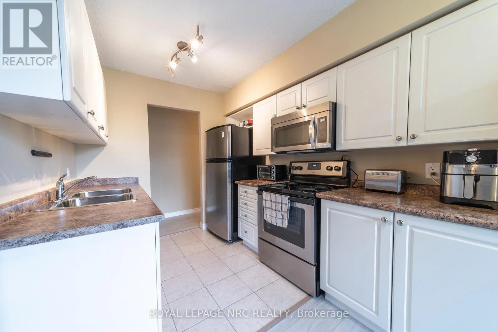 301 - 6400 HUGGINS STREET #301