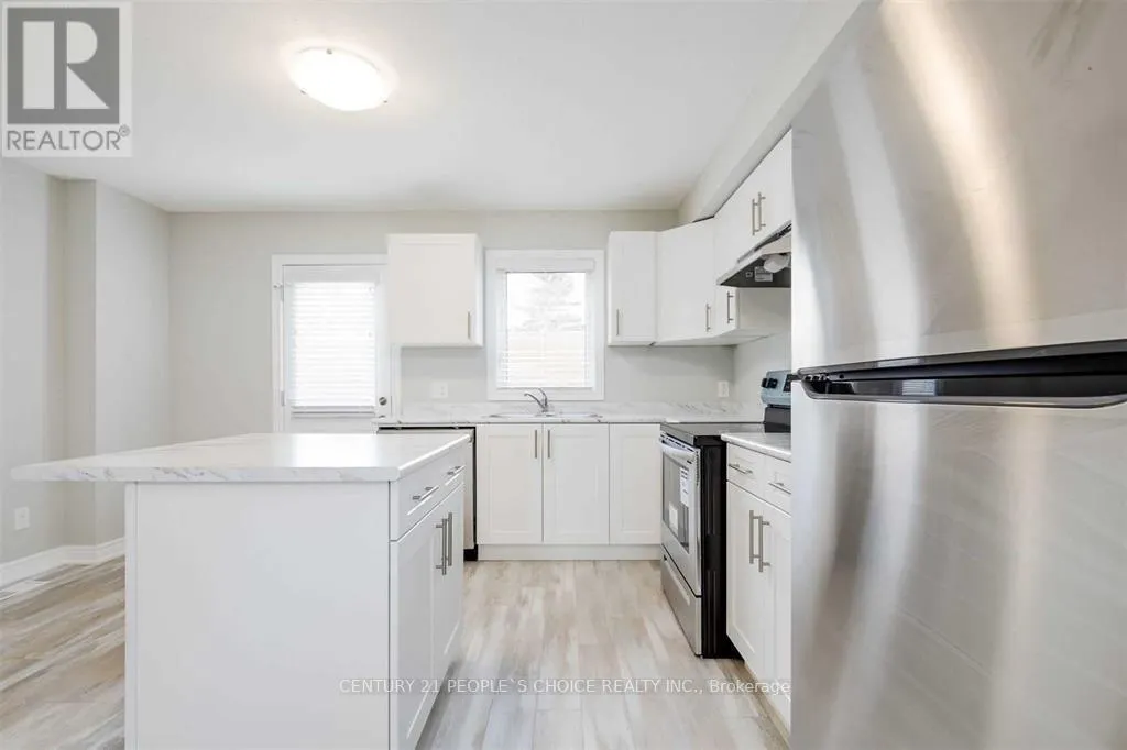 75 - 7768 ASCOT CIRCLE