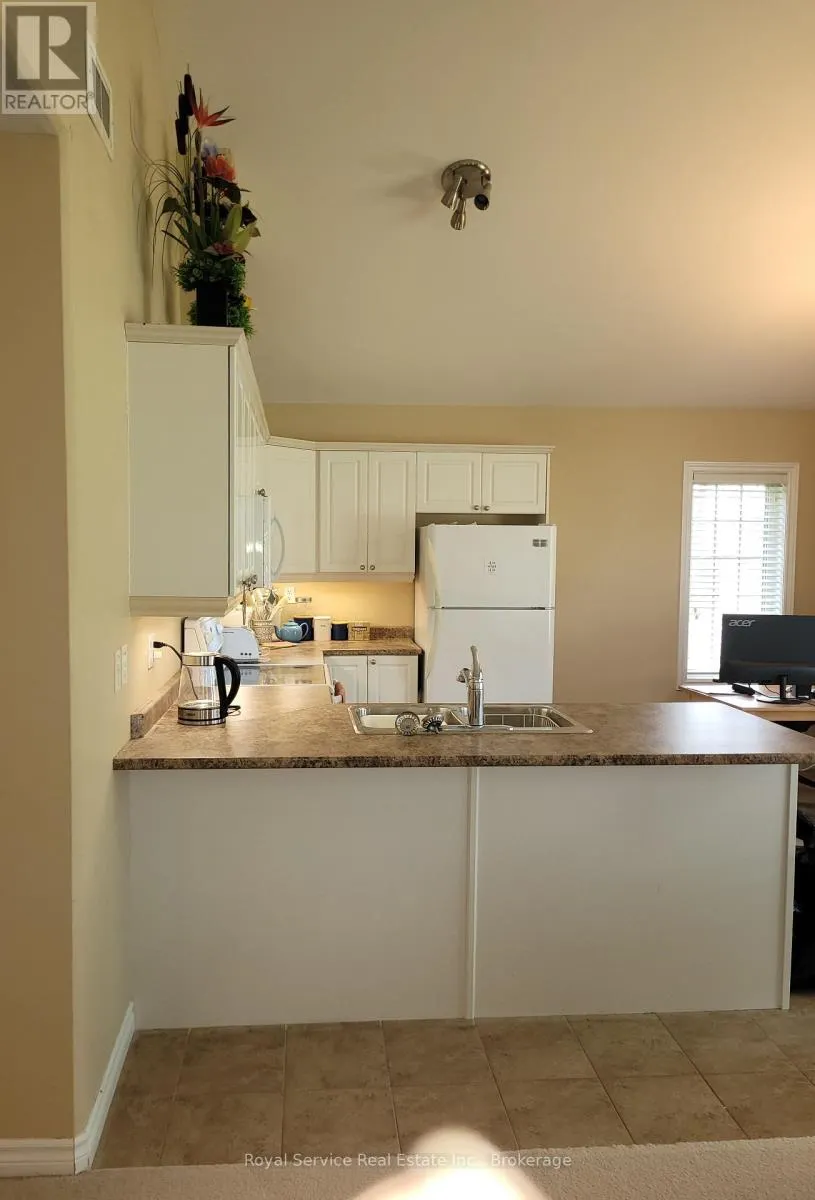 102 - 325 DENSMORE ROAD #102