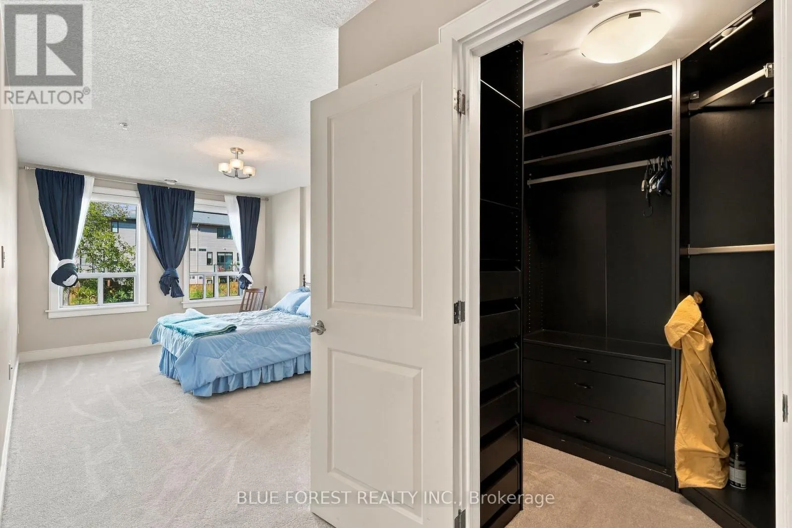 205 - 320 SUGARCREEK TRAIL #205