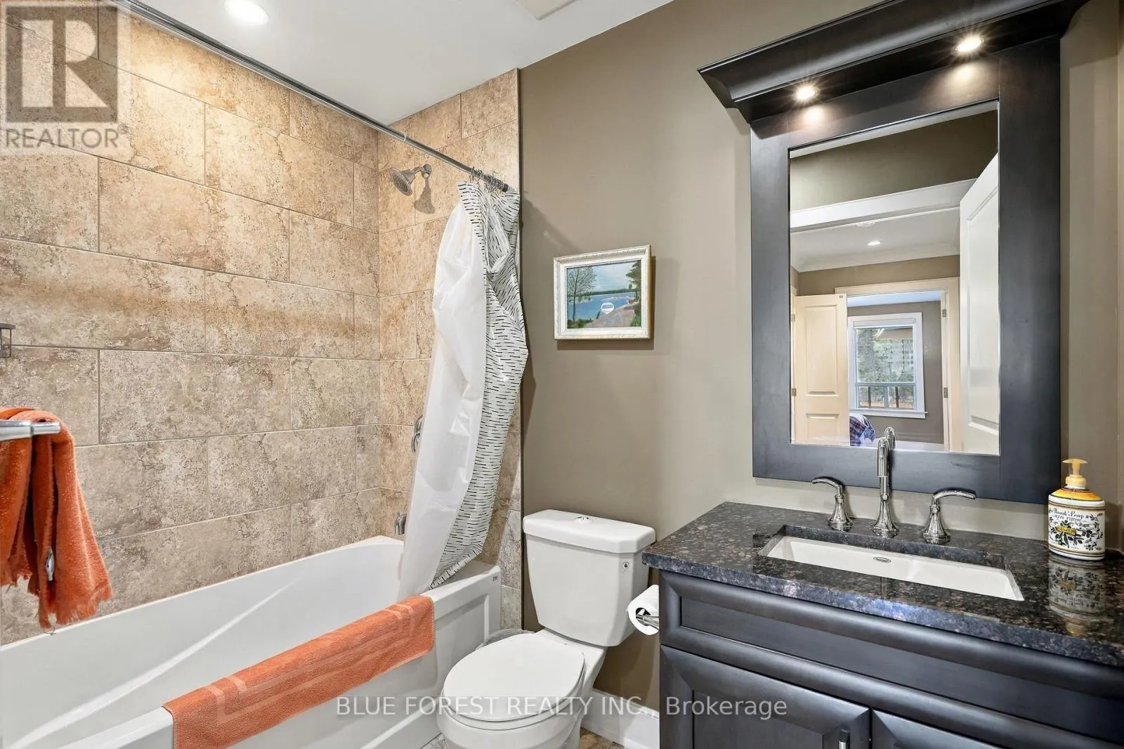 205 - 320 SUGARCREEK TRAIL #205