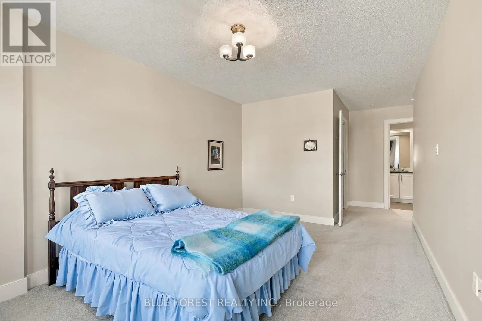 205 - 320 SUGARCREEK TRAIL #205