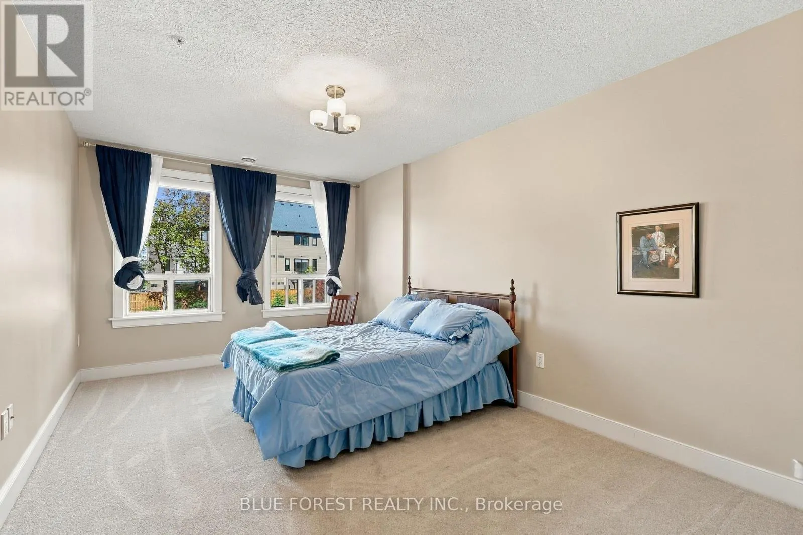 205 - 320 SUGARCREEK TRAIL #205