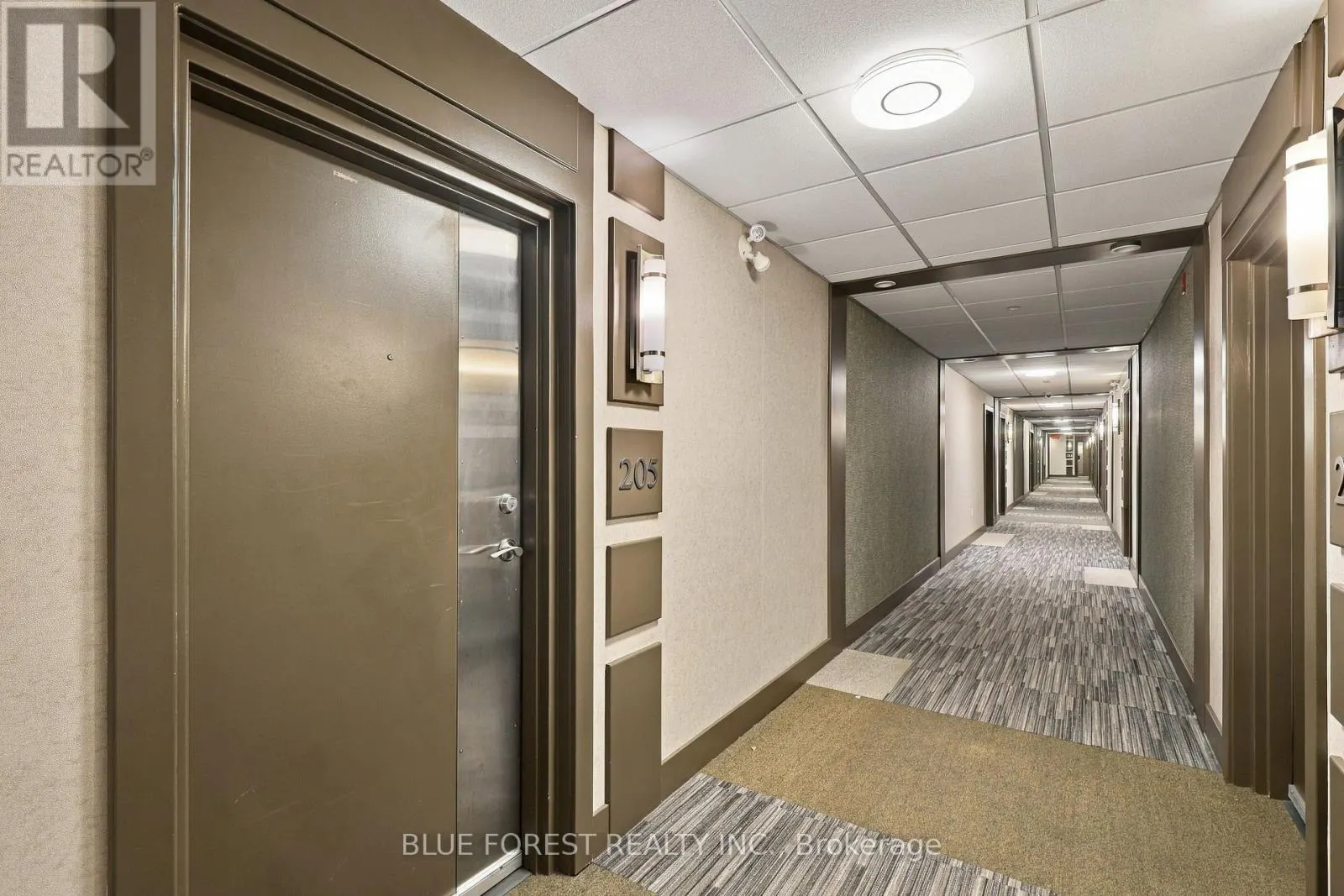 205 - 320 SUGARCREEK TRAIL #205