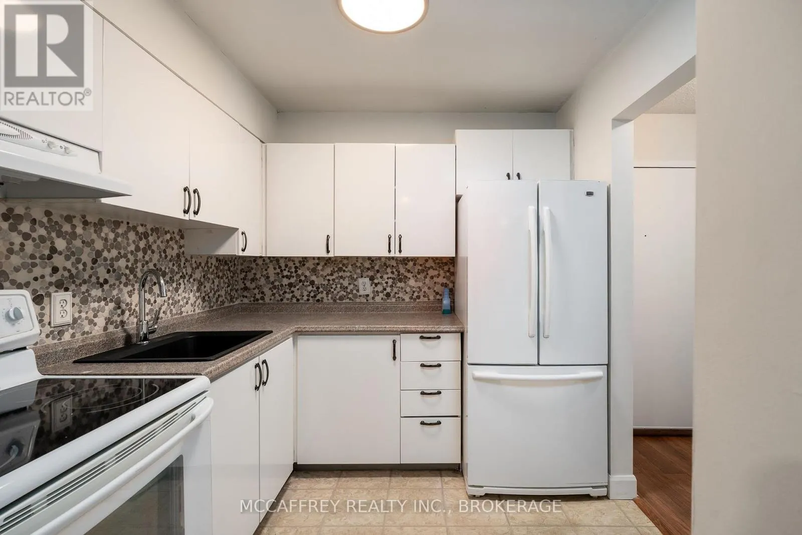 103 - 310 KINGSDALE AVENUE #103