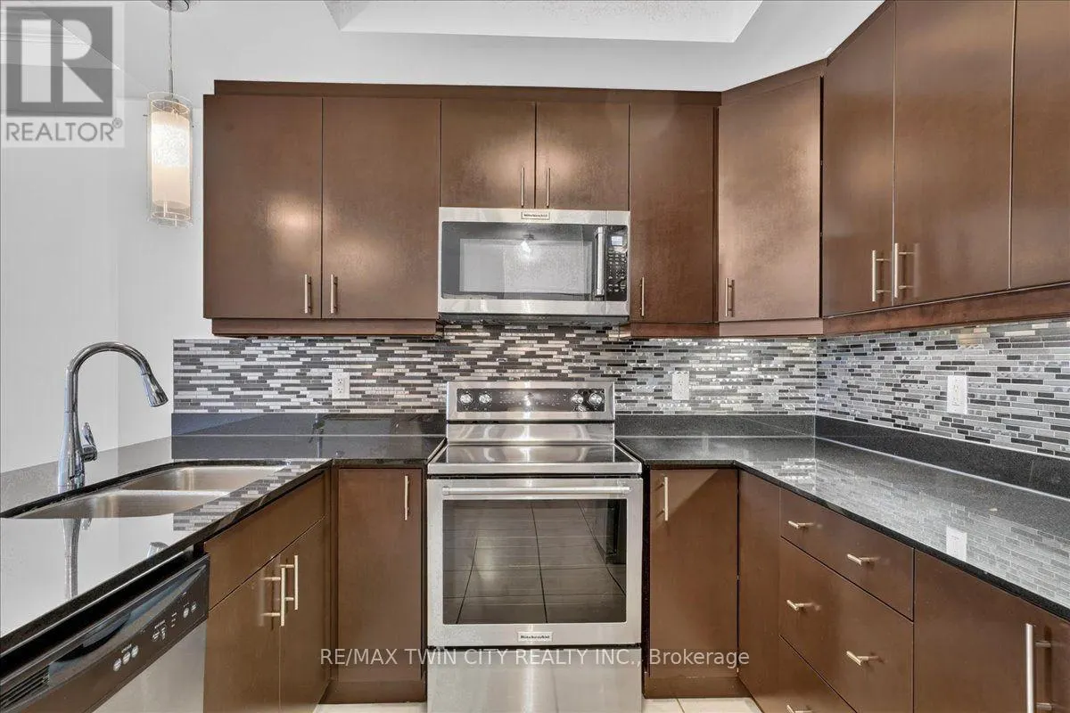 307 - 539 BELMONT AVENUE W