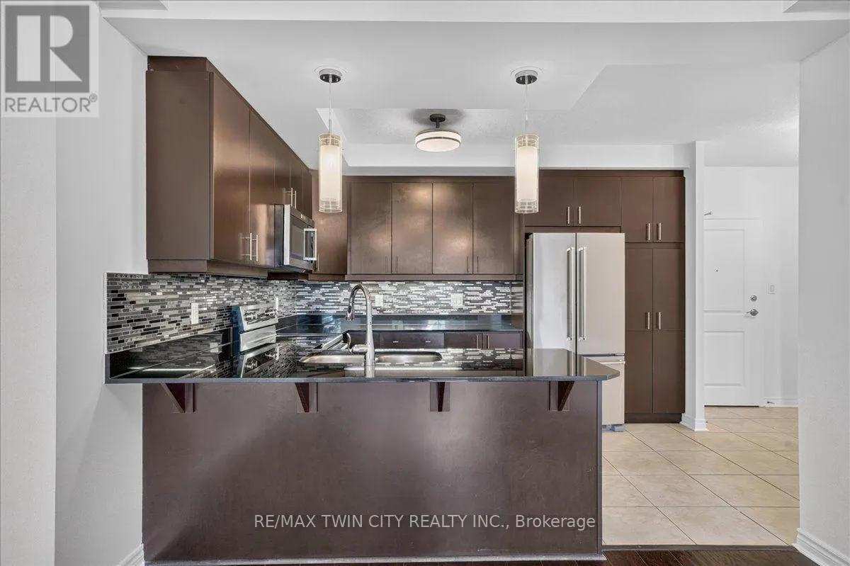 307 - 539 BELMONT AVENUE W
