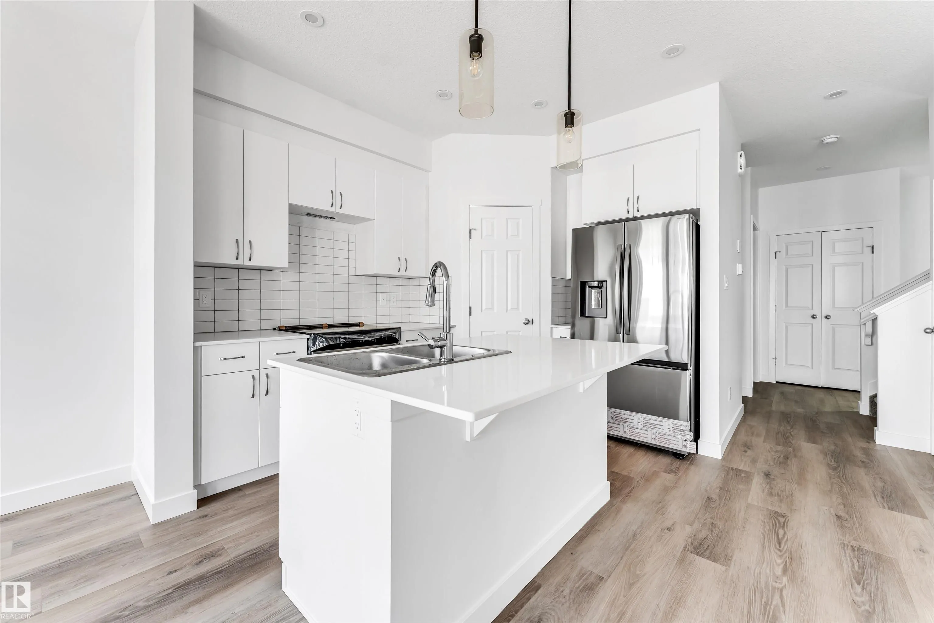1216 13 Ave
