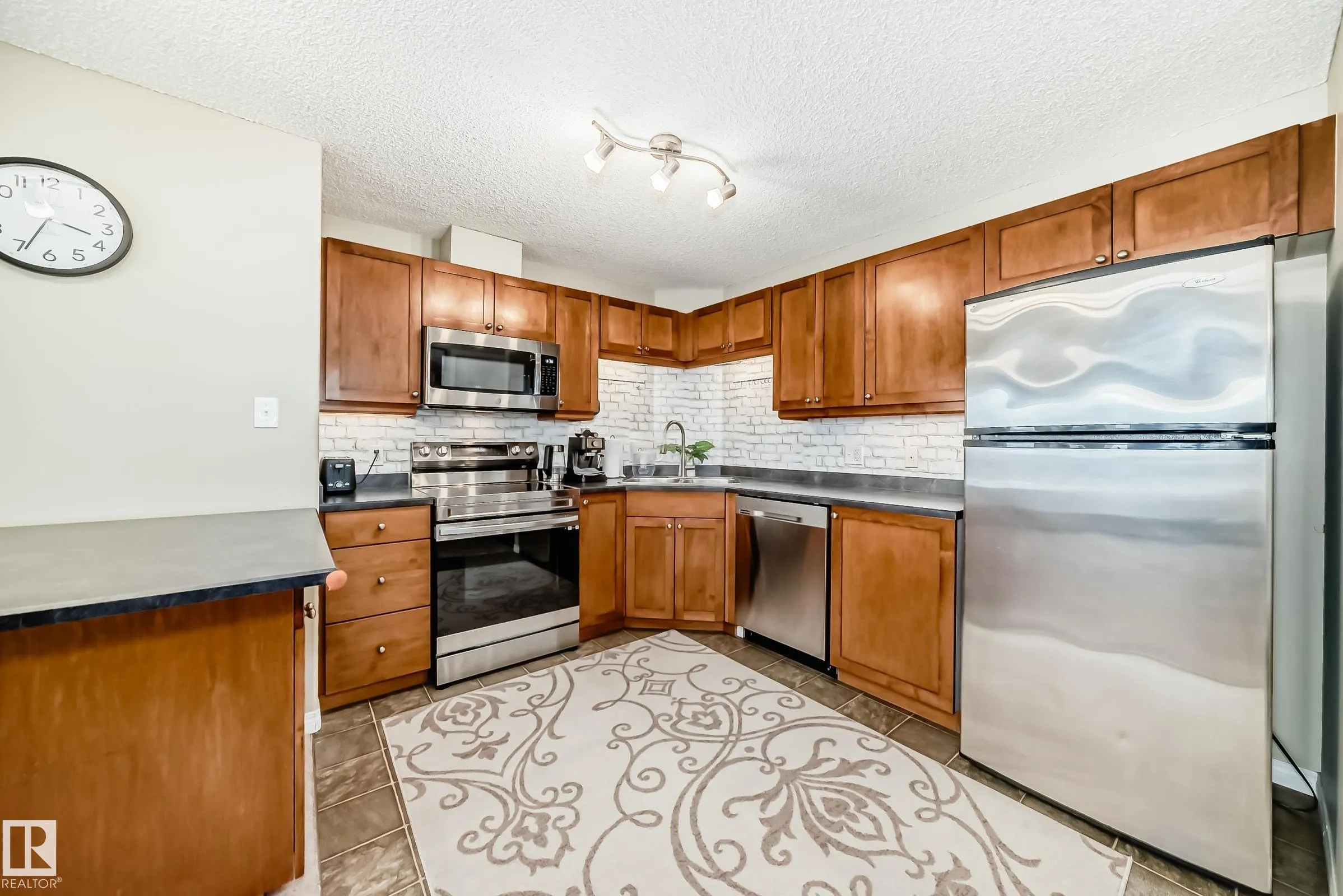 7339 SOUTH TERWILLEGAR DR NW