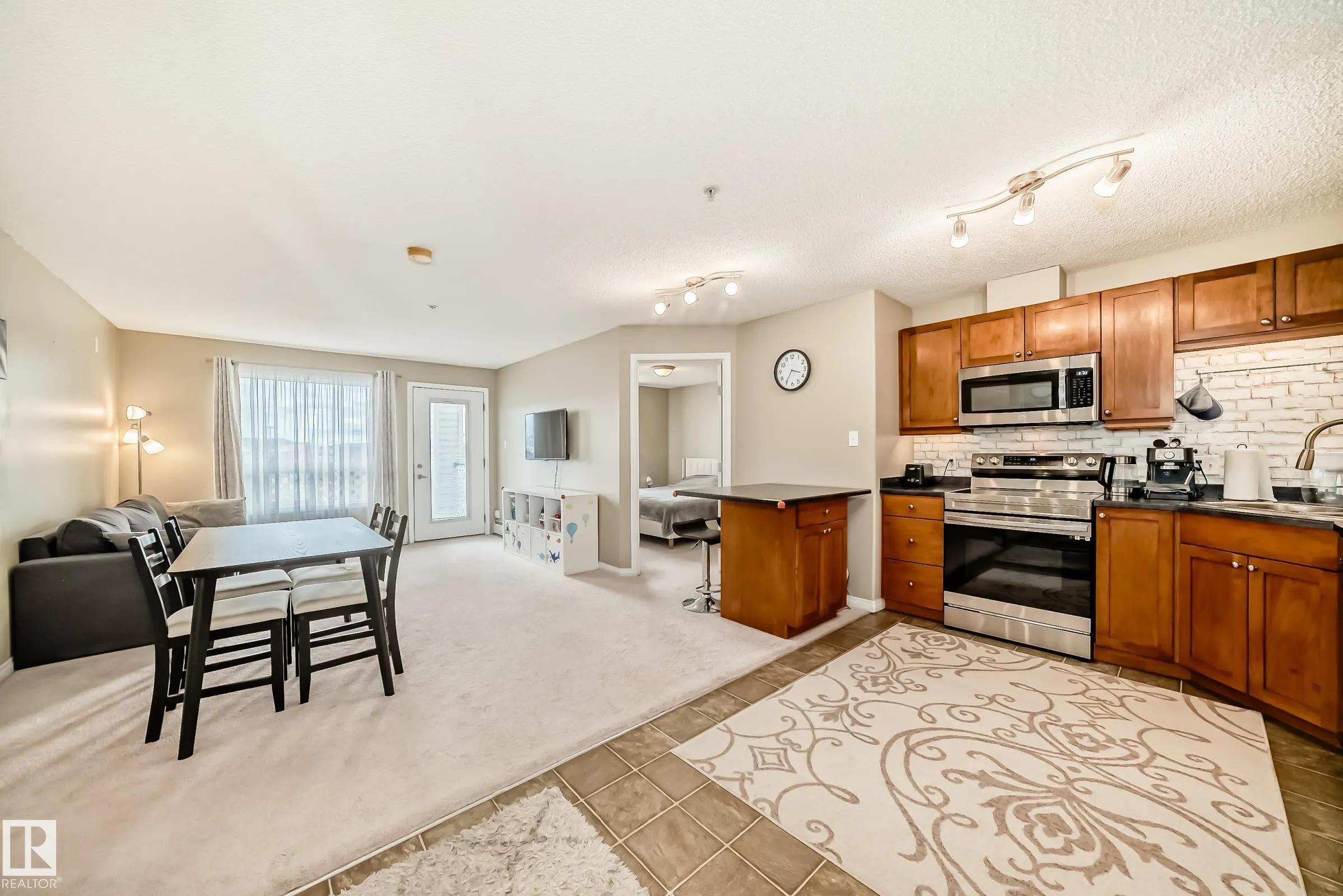 7339 SOUTH TERWILLEGAR DR NW