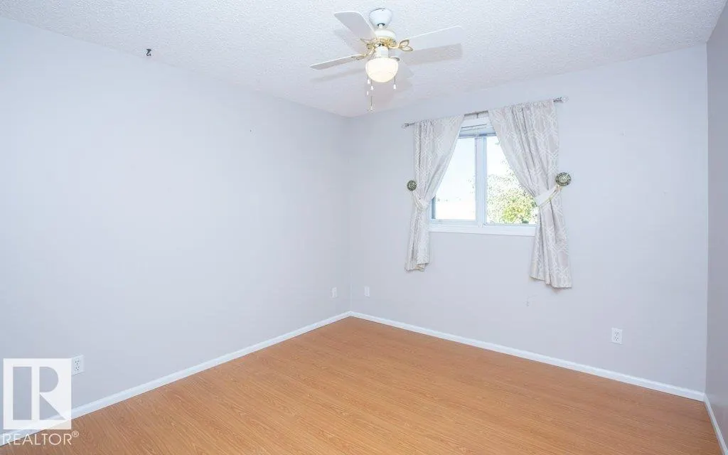 11015 105 St
